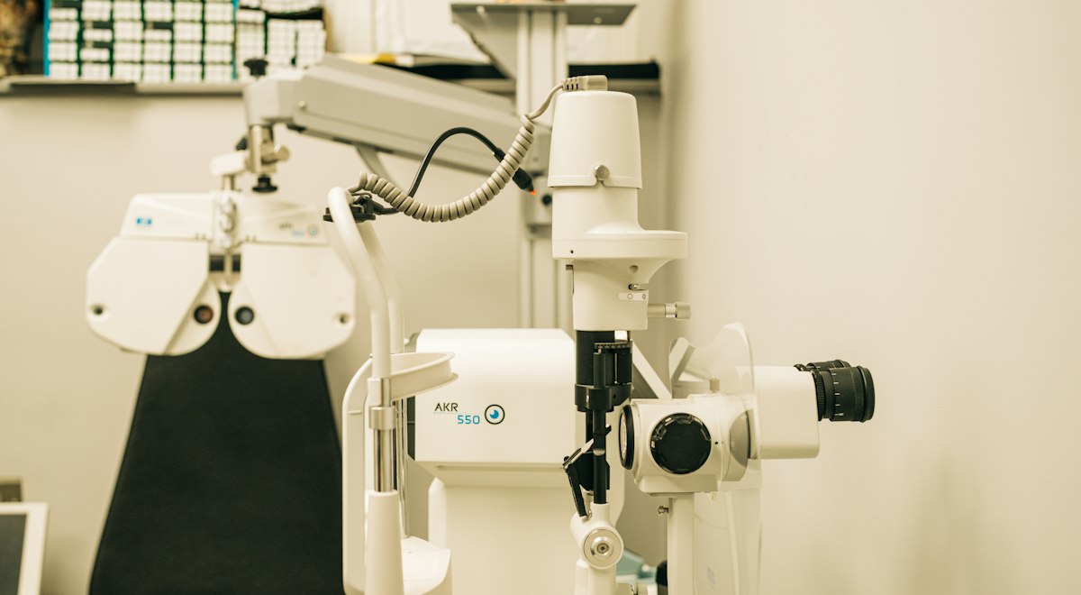 Ophthalmic surgeons performing eye surgery in an operating theatre